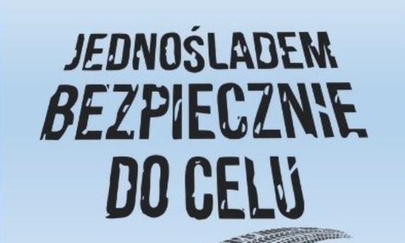 napis: jednośladem bezpiecznie do celu